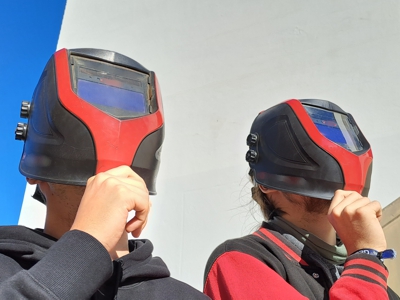Beobachtung mit Schweiß-Helmen